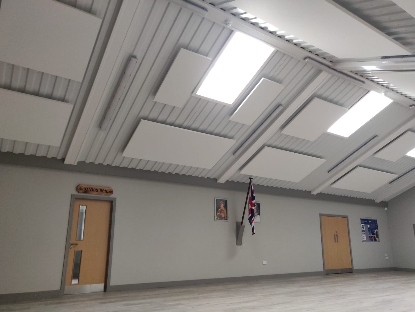 Scout hall with acoustic panels on ceiling