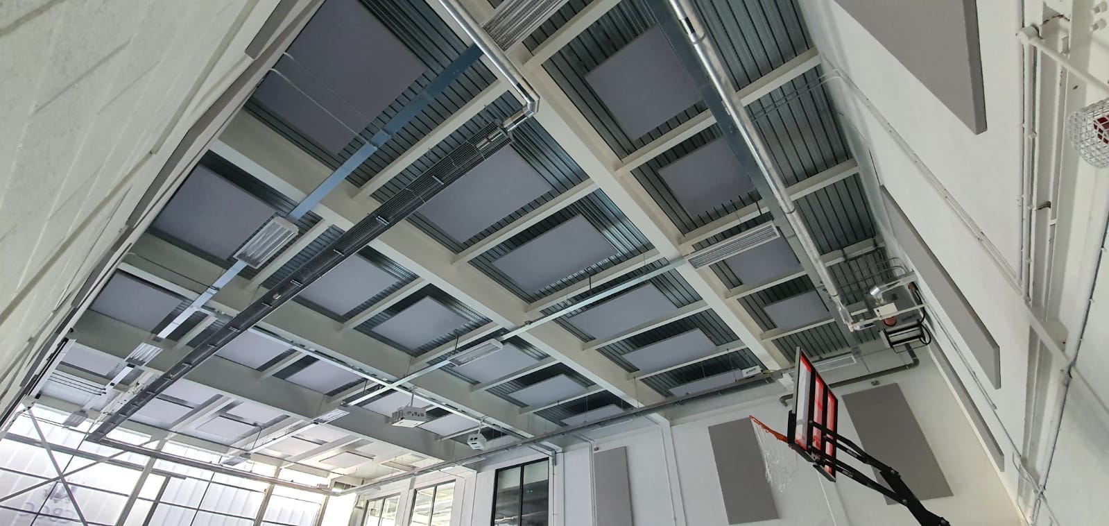 Youth club with acoustic rafts on the ceiling