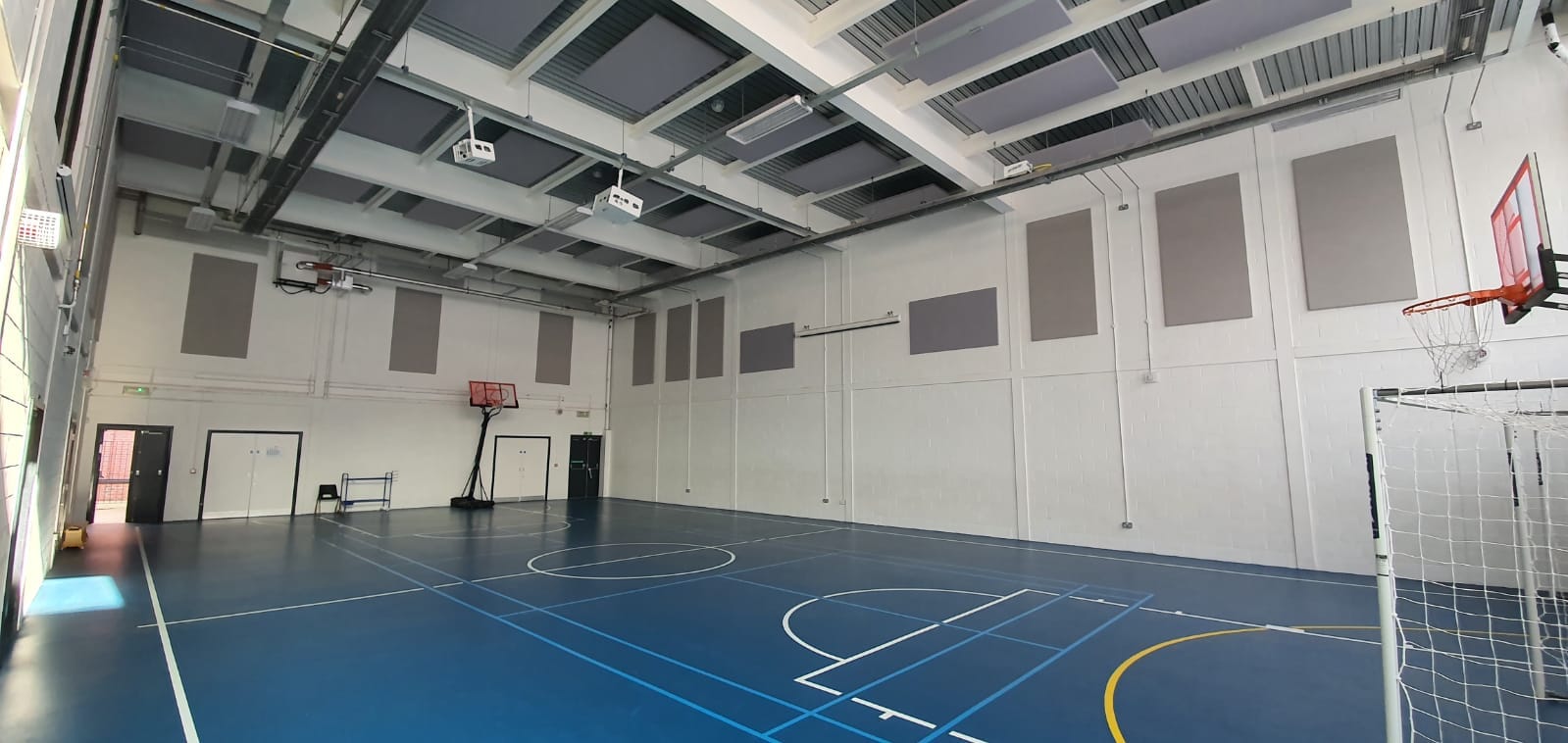 Youth club with acoustic rafts on the ceiling