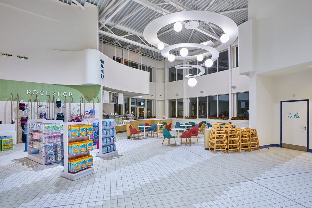 Cafe in leisure centre with acoustic treatments on ceiling