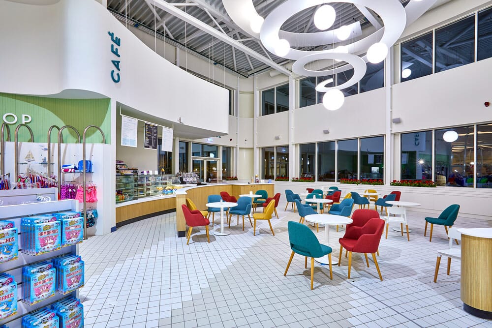 Cafe in leisure centre with acoustic treatments on ceiling