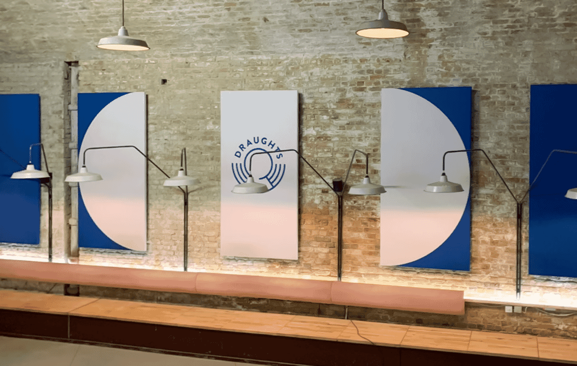 Custom branded acoustic panels installed at Draughts Restaurant to manage noise when the space is busy.