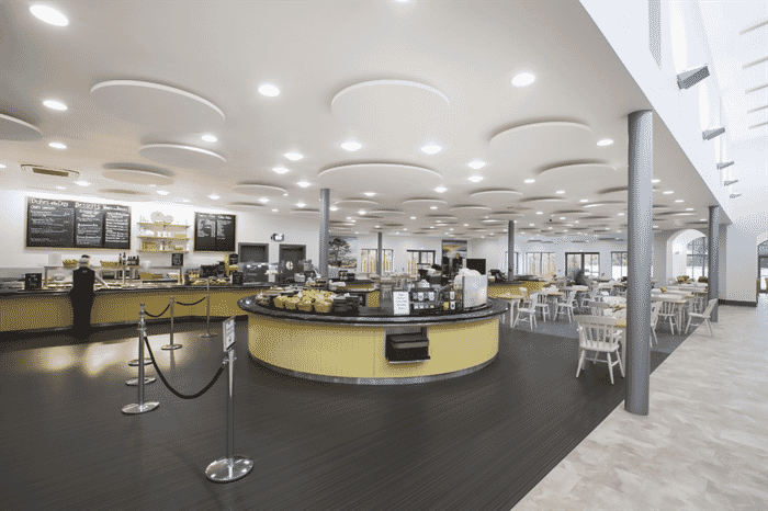 Ecophon Solo Circle acoustic panels installed at Brodie Countryfare to reduce noise levels and improve the restaurant acoustics.