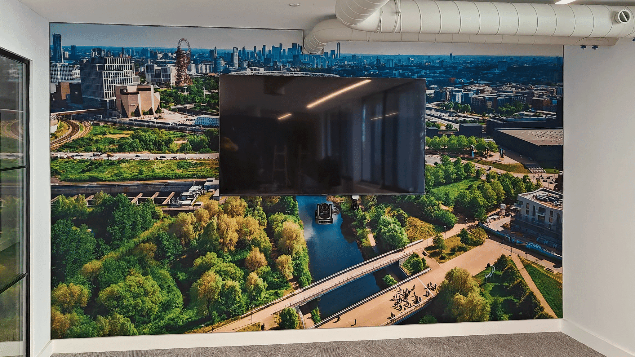 Custom printed acoustic wall panel installed at Mosaic East