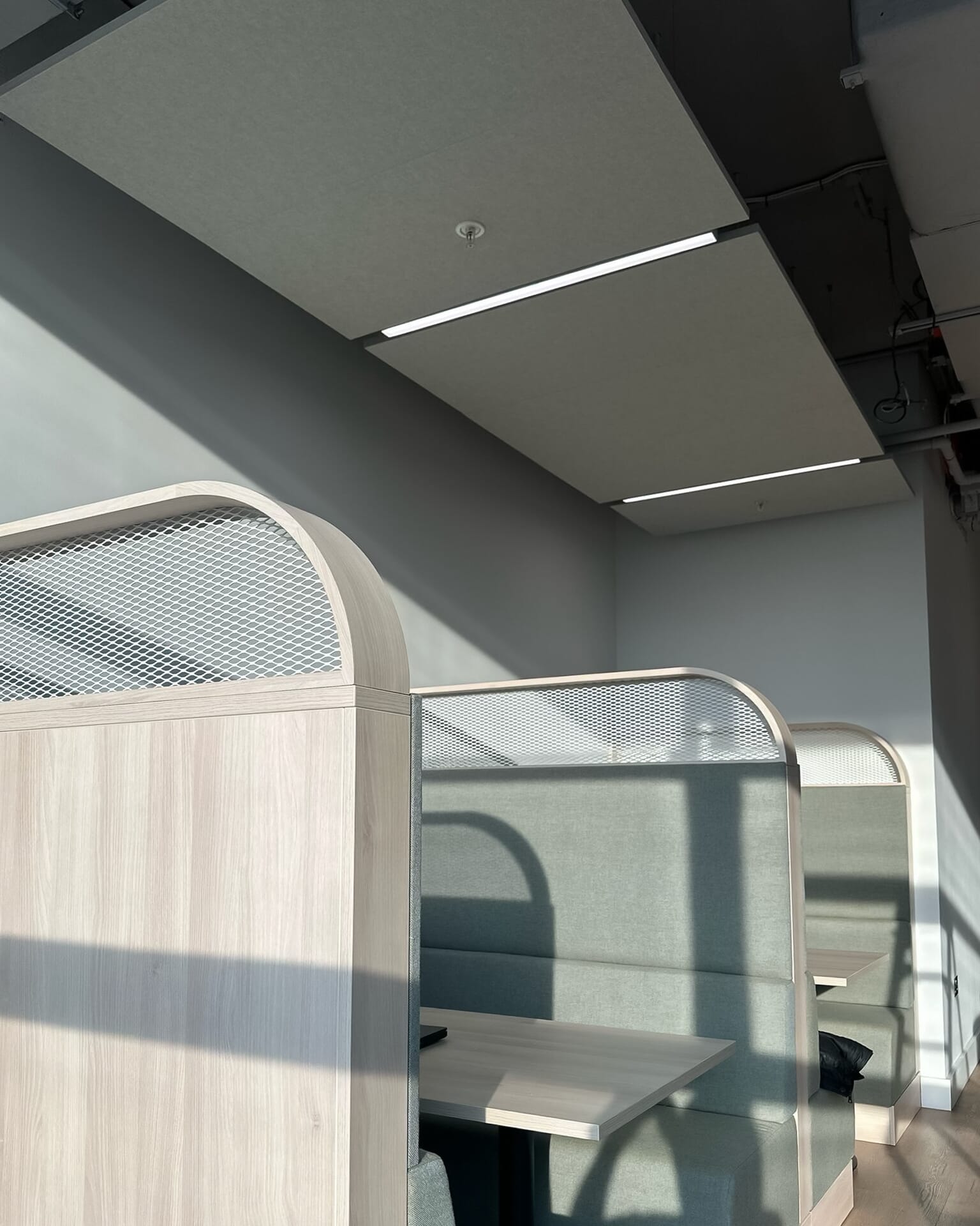 Autex acoustic panels installed on the ceiling of a co-working space